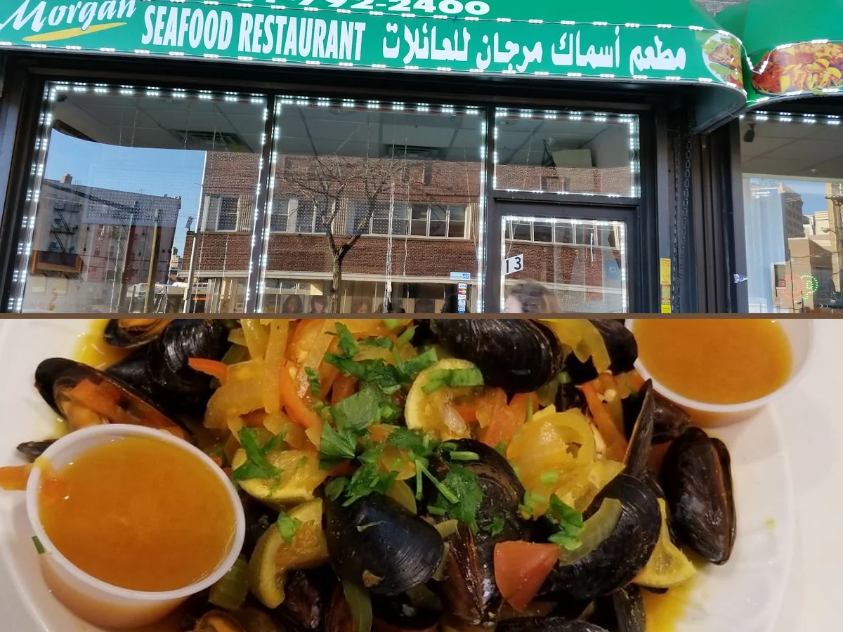 Plates of Mediterranean seafood on a simple table.